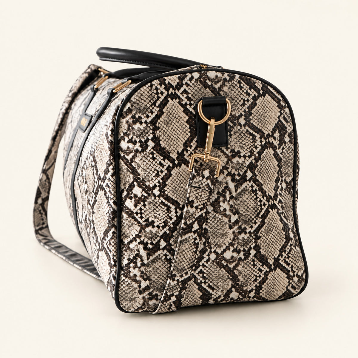 Details der Santana Vega Reisetasche mit Schlangenmuster