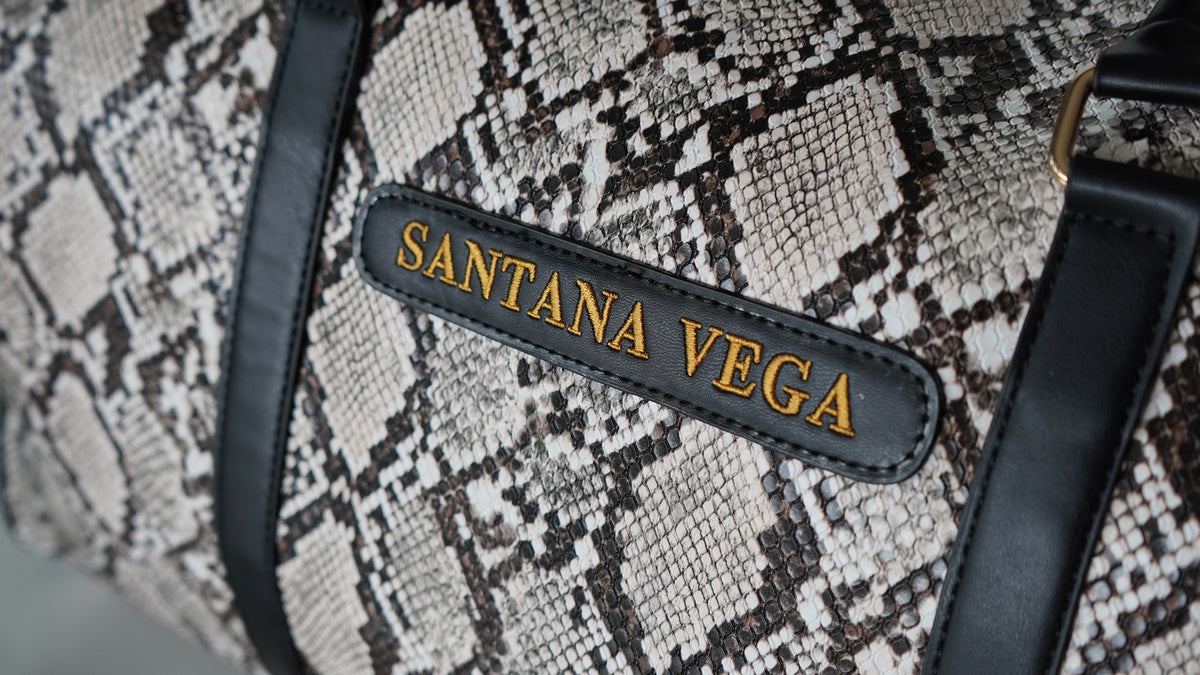 Verarbeitung der Santana Vega Reisetasche mit Schlangenmuster
